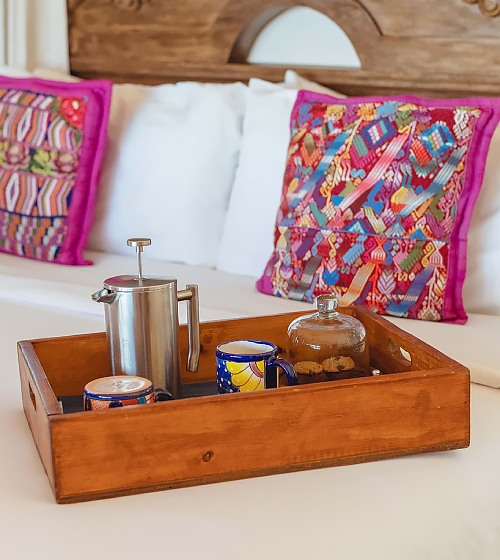 Freshly brewed coffee deilivered every morning to your ocean front room at Villa Santa Cruz